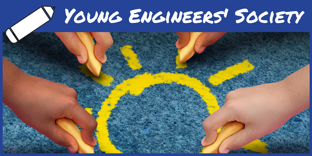 Young Engineers' Society. 4 students work together to draw a sun on the blacktop using yellow chalk.